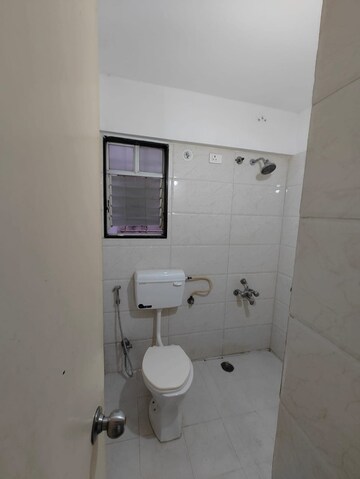 Bathroom in 2 BHK Apartment at Abhinav Pebbles Urbania, Bavdhan – for Rent