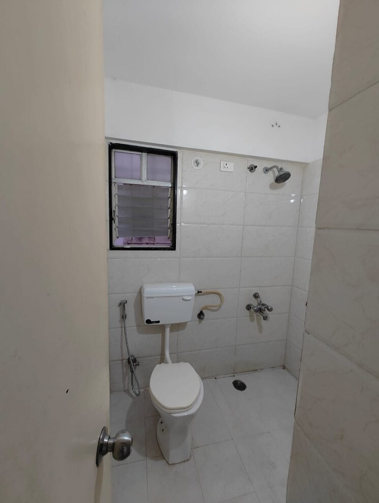 Bathroom, abhinav-pebbles-urbania 2 Bedroom 800 Sq.Ft. Apartment In Bavdhan Pune 9217356