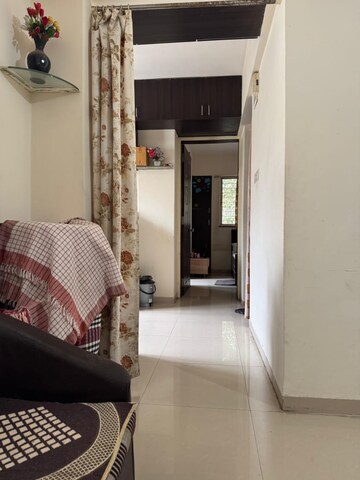 Living Room in 1 BHK Apartment at Wadgaon Sheri – for Rent