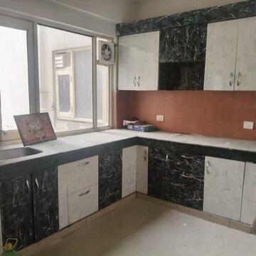 Kitchen in 2 BHK Apartment at ROF Aalayas, Sector 102 – for Rent