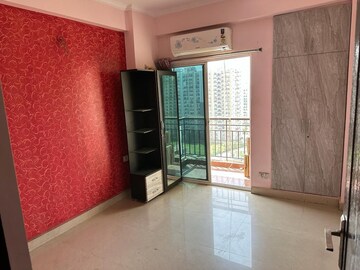 Living Room in 2.5 BHK Apartment at Aims Golf City, Sector 75 – for Rent