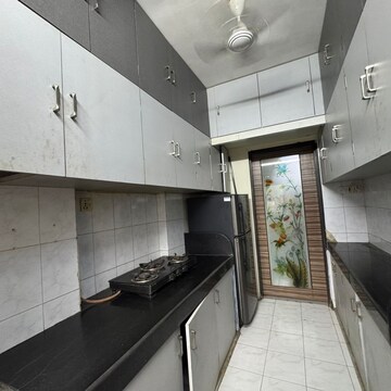 Kitchen in 2 BHK Apartment at Simran CHS Santacruz, Vithaldas Nagar – for Rent