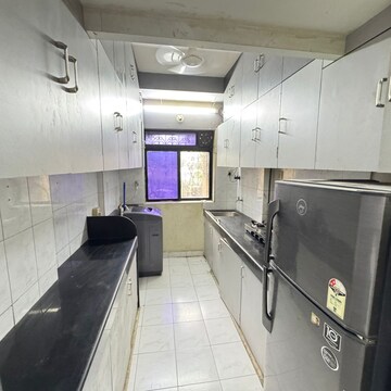 Kitchen in 2 BHK Apartment at Simran CHS Santacruz, Vithaldas Nagar – for Rent