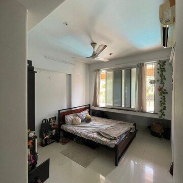Bedroom in 2 BHK Apartment at Swastik Plaza Juhu, Vallabh Nagar Society – for Rent