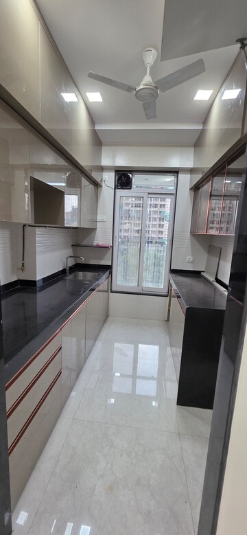 Kitchen in 2 BHK Apartment at Triumph Swastik, Malad West – for Sale
