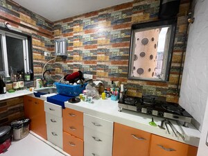 Team Area in 1 BHK Apartment at Rustomjee OZone, Goregaon West – for Sale