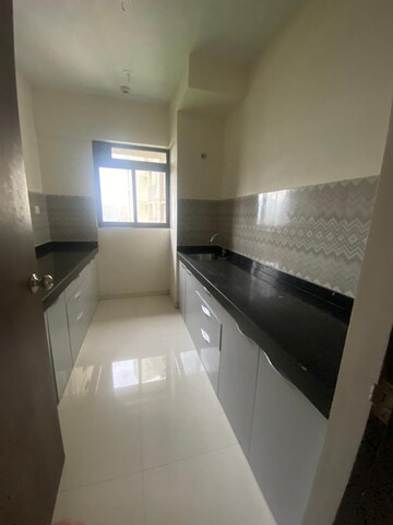 Kitchen in 2 BHK Apartment at Delta Woods, Mira Road East – for Rent
