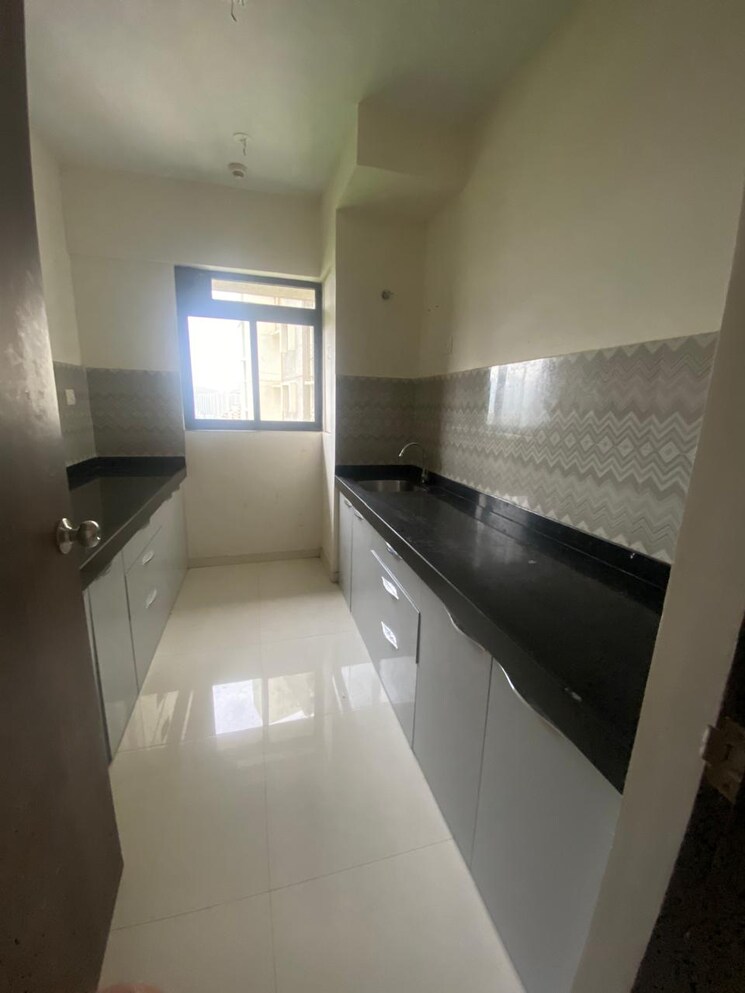 Kitchen, delta-woods 2 Bedroom 850 Sq.Ft. Apartment In Mira Road East Thane 9217480