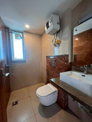 Bathroom in 3 BHK Builder Floor at Sushant Lok I – for Rent