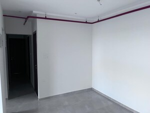 Room in 2 BHK Apartment at Rustomjee Elanza, Malad West – for Sale