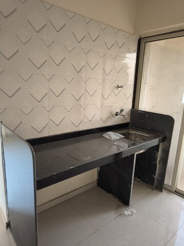 Kitchen in 1 BHK Apartment at Seven Eleven Apna Ghar Phase III, Mira Road – for Rent