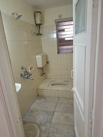 Bathroom in 2 BHK Apartment at Flower Valley Complex, Khopat – for Sale