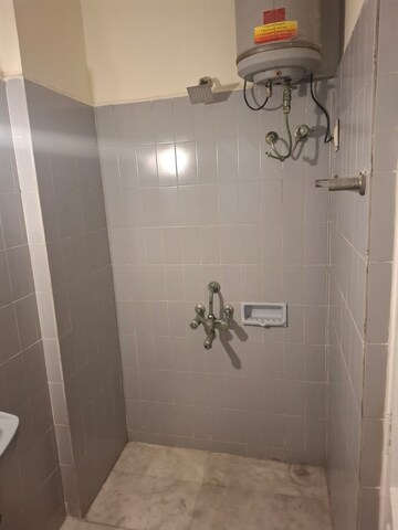 Bathroom in 2 BHK Apartment at Flower Valley Complex, Khopat – for Sale