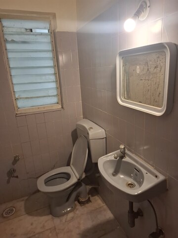 Bathroom in 2 BHK Apartment at Flower Valley Complex, Khopat – for Sale