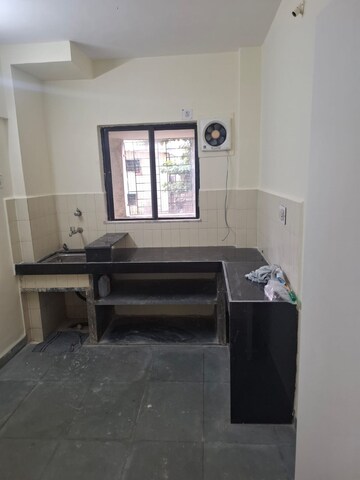 Kitchen in 2 BHK Apartment at Flower Valley Complex, Khopat – for Sale