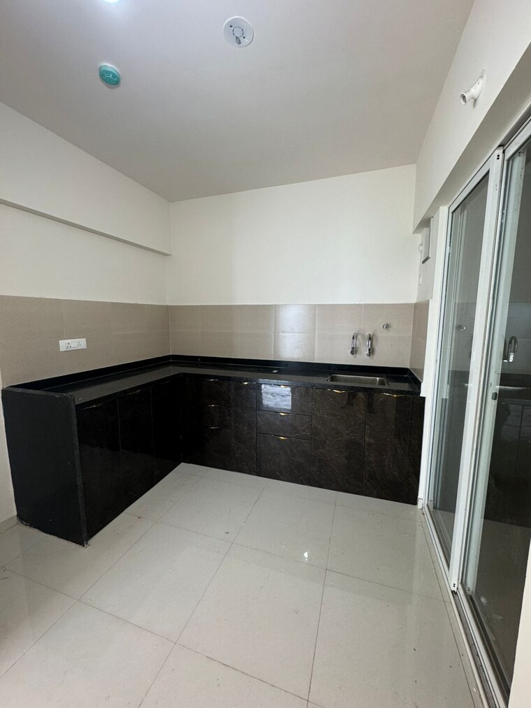 Kitchen, mantra-monarch 2 Bedroom 685 Sq.Ft. Apartment In Balewadi Pune 9217545