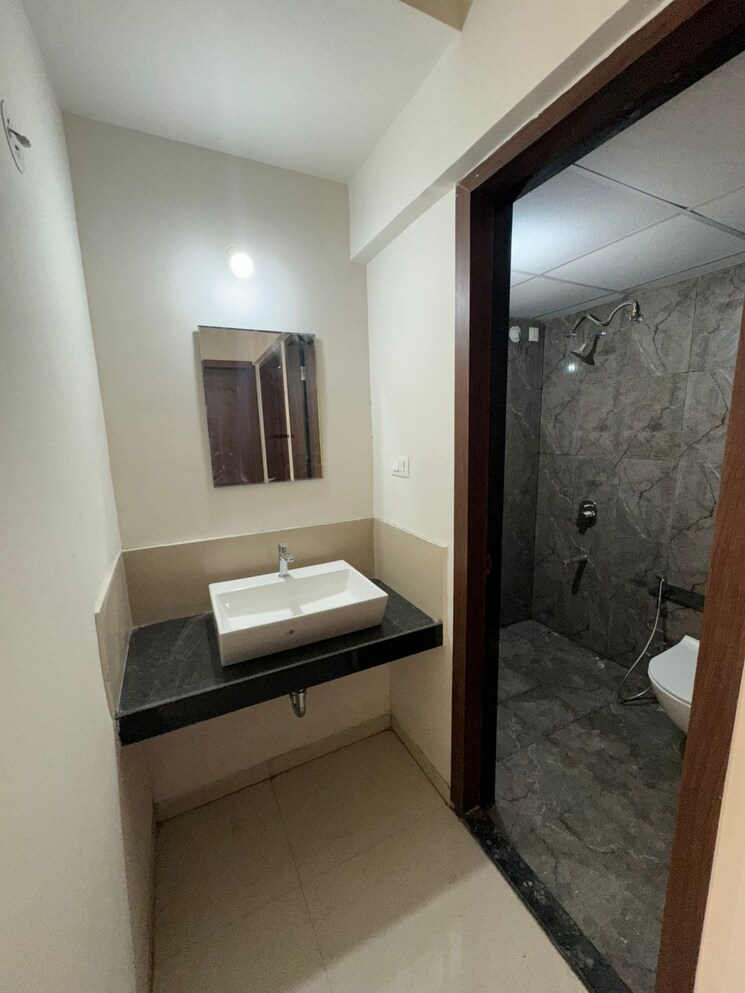 Bathroom, mantra-monarch 2 Bedroom 685 Sq.Ft. Apartment In Balewadi Pune 9217545