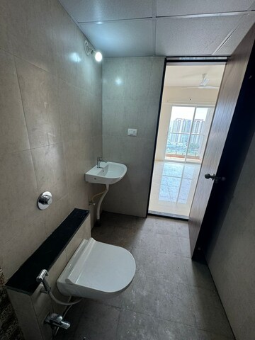 Bathroom in 2 BHK Apartment at Mantra Monarch, Balewadi – for Rent