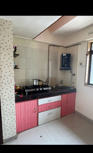 Kitchen in 2 BHK Apartment at Riddhi Garden, Malad East – for Sale