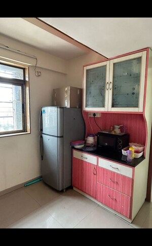 Kitchen in 2 BHK Apartment at Riddhi Garden, Malad East – for Sale