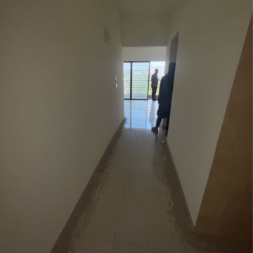 Building Lobby in 2 BHK Apartment at Skyi Songbirds, Bhugaon – for Rent