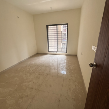 Room in 2 BHK Apartment at Skyi Songbirds, Bhugaon – for Rent