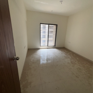 Building Lobby in 2 BHK Apartment at Skyi Songbirds, Bhugaon – for Rent