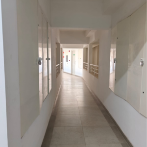 Building Lobby in 2 BHK Apartment at Paranjape Schemes Forest Trails, Bhugaon – for Rent