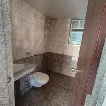 Bathroom in 2 BHK Apartment at Paranjape Schemes Forest Trails, Bhugaon – for Rent