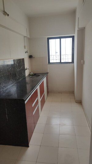 Kitchen in 1 BHK Apartment at Duville Riverdale, Kharadi – for Rent