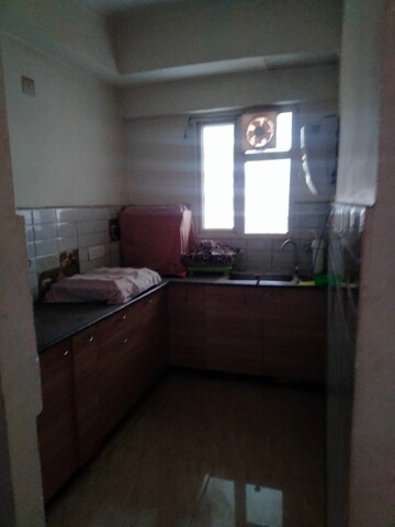 Kitchen in 2 BHK Apartment at Supertech Czar Suites, Omicron I Greater Noida – for Sale