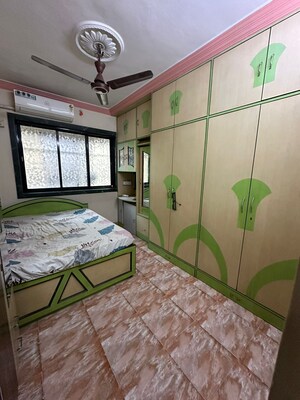 Bedroom in 1 BHK Apartment at Vighnahar CHS, Kharigaon – for Rent