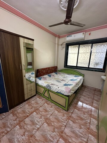 Bedroom in 1 BHK Apartment at Vighnahar CHS, Kharigaon – for Rent