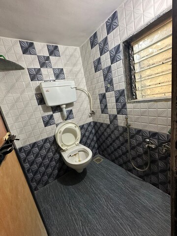 Master Bedroom in 1 BHK Apartment at Vighnahar CHS, Kharigaon – for Rent