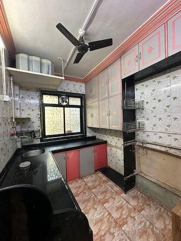 Kitchen in 1 BHK Apartment at Vighnahar CHS, Kharigaon – for Rent