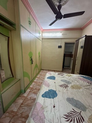 Bedroom in 1 BHK Apartment at Vighnahar CHS, Kharigaon – for Rent