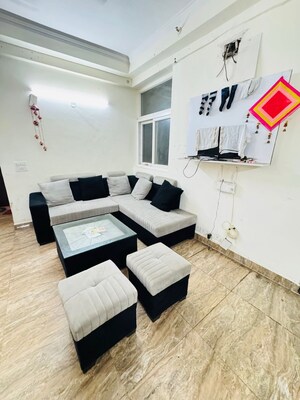 Team Area in 2 BHK Apartment at Aims Golf City, Sector 75 – for Rent