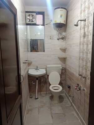 Bathroom in 3 BHK Builder Floor at Khirki Extension – for Rent