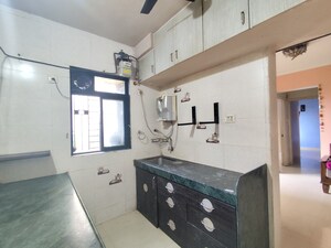 Kitchen in 1.5 BHK Apartment at Vihang Valley Phase1, Kasarvadavali – for Rent