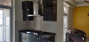 Kitchen in 2.5 BHK Apartment at Amrapali Princely Estate, Sector 76 – for Rent