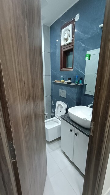Bathroom in 3 BHK Builder Floor at Hong Kong Bazaar, Sector 57 – for Rent