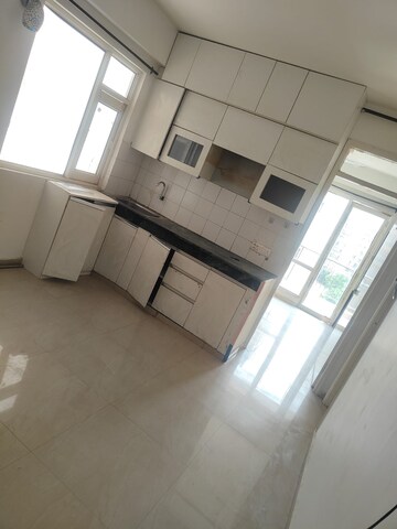 Kitchen in 1.5 BHK Apartment at ROF Aalayas, Sector 102 – for Rent