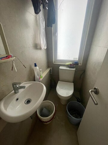 Bathroom in 2 BHK Apartment at Bharat Ecovistas, Shilphata – for Rent