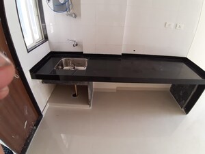 Kitchen in 2 BHK Apartment at Bhakti Elysia Apartments, Wakad – for Rent