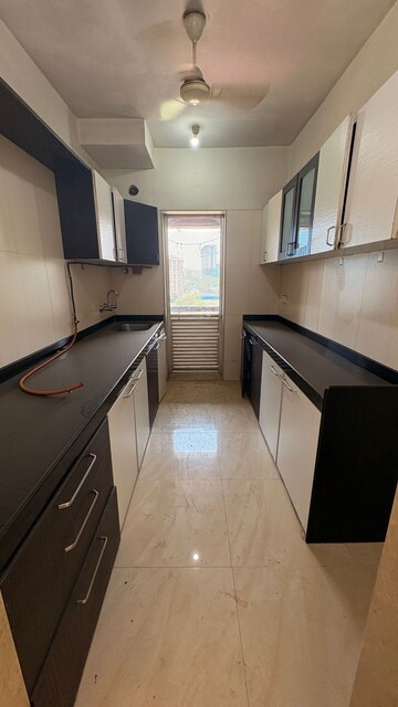 Kitchen in 2 BHK Apartment at Gundecha Symphony, Andheri West – for Sale