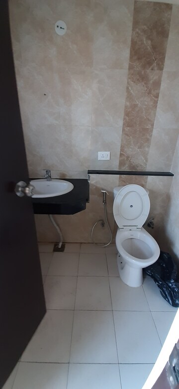 Bathroom in 3 BHK Apartment at Land Craft Golf Links Apartment Phase 2, Pandav Nagar – for Rent
