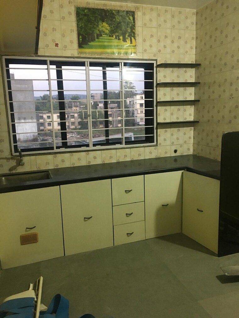 Kitchen, sun city 2 Bedroom 900 Sq.Ft. Apartment In Sun City Pune 9218521