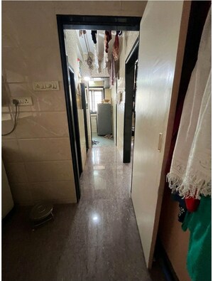 Building Lobby in 1 BHK Apartment at Lalani Residency, Kavesar – for Rent