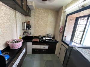 Kitchen in 1 BHK Apartment at Lalani Residency, Kavesar – for Rent