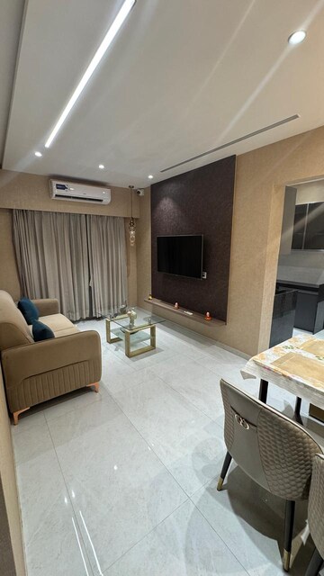 Living Room in 1 BHK Apartment at Harsh Trinity Oasis, Bapane – for Sale